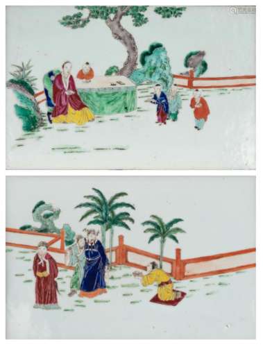 Two Chinese famille rose plaques, decorated with figures in a garden, framed, 25 x 38 cm