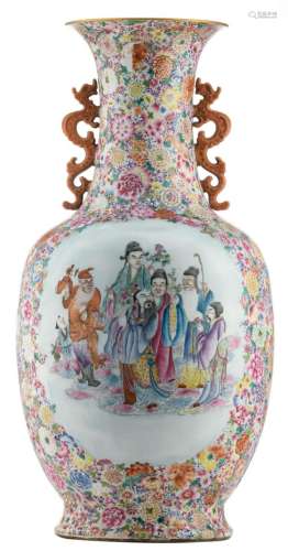 A large Chinese millefleurs and famille rose baluster shaped vase, decorated with animated scenes, marked Qianlong, H 76 cm