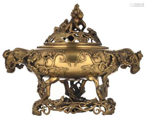 A Chinese gilt bronze open work incense burner and cover, relief decorated with rats and mythical animals, on a ditto base, H 39 cm