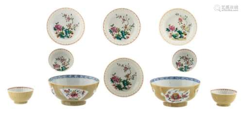 Two Chinese blue and white and famille rose café au lait floral decorated export porcelain bowls, 18thC; added four ditto cups and saucers, H 4,5 - 8 - ø 13,5 cm