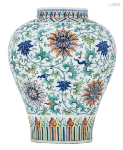 A Chinese famille verte vase, overall decorated with Shu symbols, lotus scrolls and flowers, with a Qianlong mark, about 1900, H 33 cm