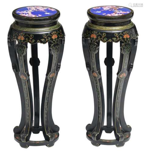 A pair of Chinese black lacquered polychrome and gilt decorated wooden stools, the cloisonné top with birds and flower branches, H 86 - 86,5 - ø 36 cm