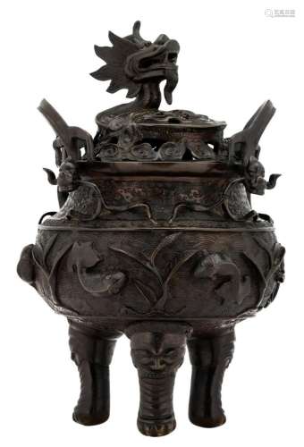 A Chinese open work and dragon relief decorated bronze tripod incense burner, H 41,5 cm