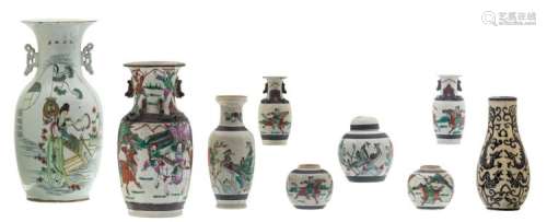 A various Chinese famille rose, polychrome and relief decorated stoneware, some marked; added a Chinese famille rose vase, decorated with a lady on a terrace and calligraphic texts, H 10 - 42,5 cm