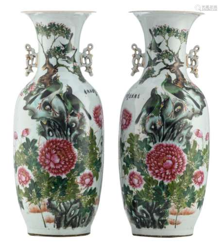 A pair of Chinese famille rose vases, decorated with birds, a rock, flower branches and calligraphic texts, H 57,5 - 58 cm
