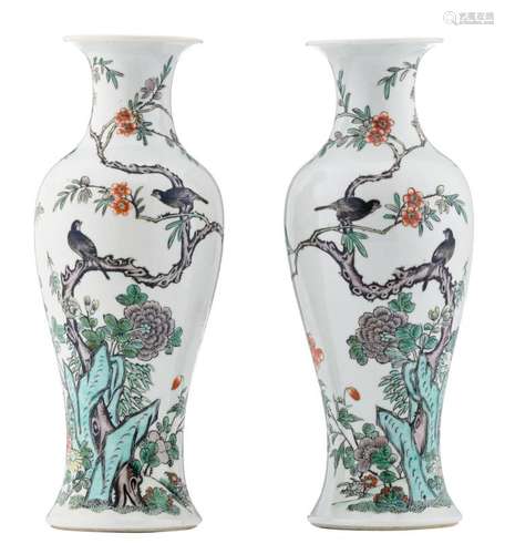 A pair of Chinese famille verte baluster shaped vases, decorated with birds on flower branches, 19thC, H 29,5 - 30 cm