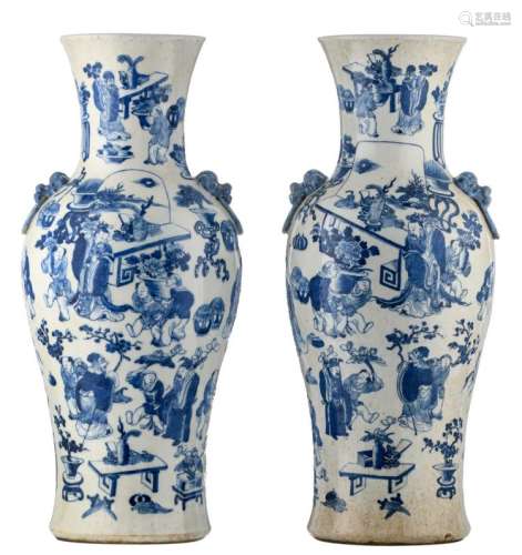 A pair of Chinese blue and white stoneware baluster shaped vases, overall decorated with Immortals, about 1900, H 61,5 cm