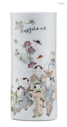 A Chinese polychrome cylindrical vase, decorated with children in a garden and a calligraphic text, marked, H 28 cm