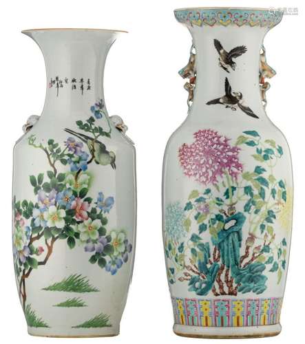 A Chinese famille rose vase, both sides decorated with birds and flower branches, 19thC; added a similar vase with a calligraphic text, marked, H 56 - 61 cm