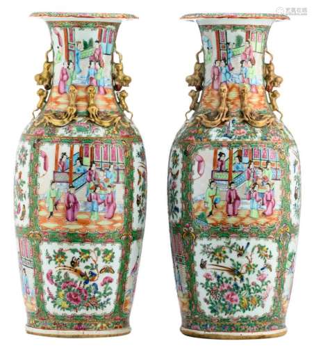 A pair of Chinese Canton famille rose vases, the roundels decorated with court scenes, birds, butterflies and flower branches, 19thC, H 60,5 cm