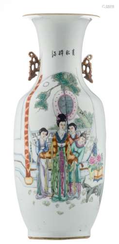 A Chinese famille rose decorated vase with court ladies in a garden and calligraphic texts, H 59 cm