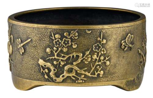 A Chinese bronze relief decorated tripod incense burner with flower branches, butterflies and dragonflies, with a Xuande mark, 17th/18thC, H 8,7 - ø 17,3 cm