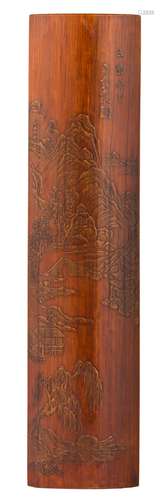 A Chinese bamboo wrist rest, basso relievo decorated with a mountainous landscape, signed, late Qing, W 29 cm