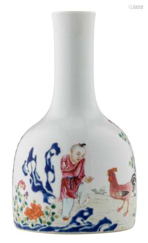 A Chinese famille rose bottle vase, decorated with a boy and a cockerell in a garden, and a calligraphic text, with a Qianlong mark, H 18 cm