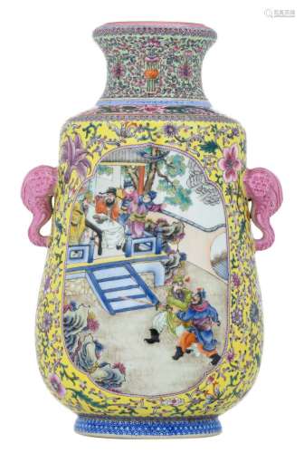 A Chinese yellow ground famille rose floral decorated vase, the roundels with warriors and a court scene, the handles elephant head shaped, with a Qianlong mark, H 41 cm