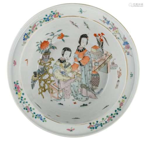 A Chinese polychrome and iron red floral decorated charger, the inside with two court ladies, H 12 - ø 36 cm