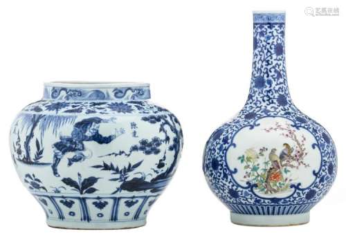 A Chinese blue and white bottle vase, the roundels famille rose decorated with birds on flower branches, with a Qianlong mark; added a ditto pot, overall decorated with warriors in a landscape, H 28,5 - 42 cm