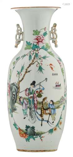 A Chinese famille rose floral decorated vase, the roundel with a court lady, two children and a deer, and calligraphic text, H 57 cm
