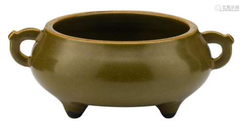 An archaic tripod teadust glazed incense burner, some gilt details, with an impressed Qianlong mark, H 7 - ø 18 cm