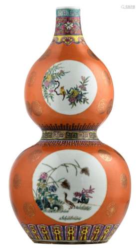 A Chinese orange ground famille rose double gourd vase, the roundels decorated with birds and flower branches, marked, H 43,5 cm