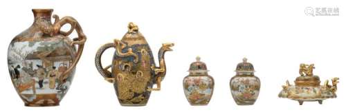 A fine Japanese vase, a tea pot and cover and an incense burner and cover, Satsouma and dragon relief decorated, all marked, Meiji; added a ditto pair of miniature vases and covers, H 8 - 18,5 cm