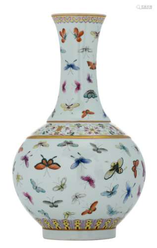 A Chinese famille rose bottle vase, overall decorated with butterflies, with a Guangxu mark, H 39 cm