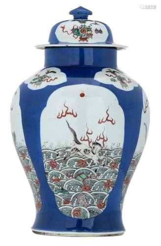 A Chinese blue soufflé famille verte vase and cover, the roundels decorated with mythical animals and antiquities, H 42 cm