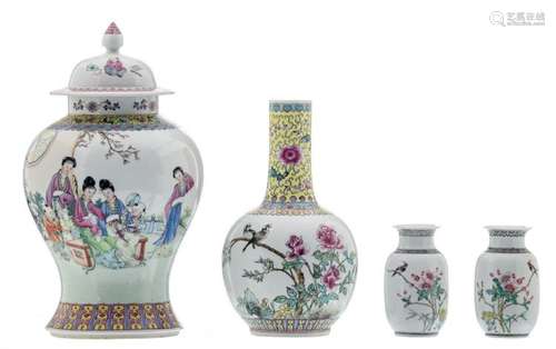 A Chinese famille rose bottle vase and vase and cover, decorated with a gallant garden scene, birds on flower branches and calligraphic texts, both marked; added a ditto pair of vases, H 15,5 - 44 cm