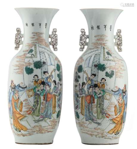 A pair of Chinese famille rose vases, decorated with musicians in a court scene and calligraphic texts, about 1900, H 57,5 - 58 cm