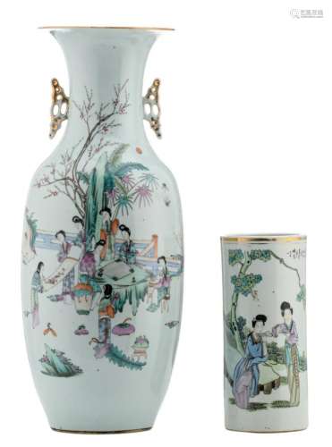 A Chinese famille rose vase, decorated with a gallant garden scene and calligraphic texts; added a ditto cylindrical vase, marked, H 28,5 - 59,5 cm