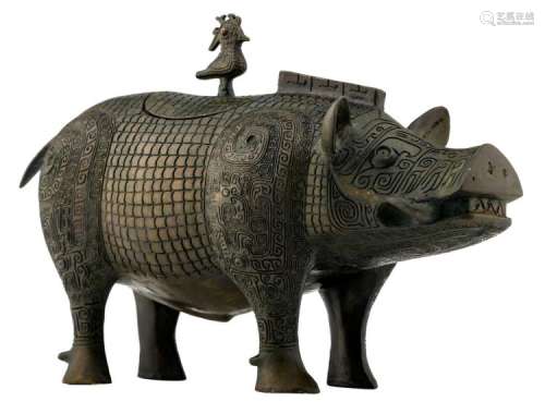 A Chinese archaic bronze incense burner, shaped as a pig, H 20,5 - W 32,5 - D 13 cm