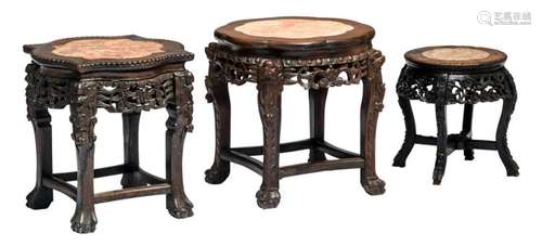 Three Chinese carved hardwood stools with marble top, H 35 - 46 - ø 35 - 52 cm