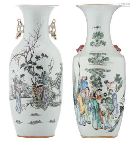 A Chinese famille rose vase, decorated with literati in a garden with bamboo, and calligraphic texts; added a ditto vase, decorated with two ladies in a garden and calligraphic texts, H 57,5 cm