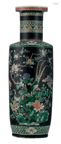 A Chinese famille noire rouleau shaped vase, decorated with peacocks and pheasants on a rock and flower branches, 19thC, H 61 cm