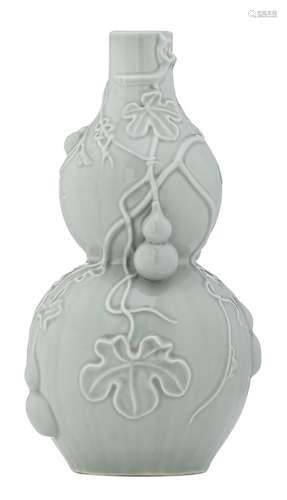 A Chinese celadon ware double gourd vase, relief decorated with calabash, H 40 cm