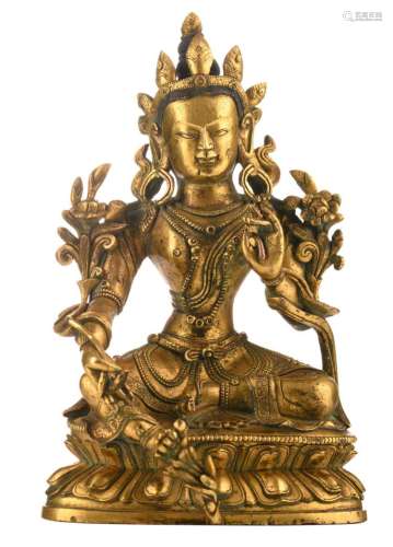 A Sino-Tibetan gilt bronze seated Buddha, with traces of polychromy, H 17 cm