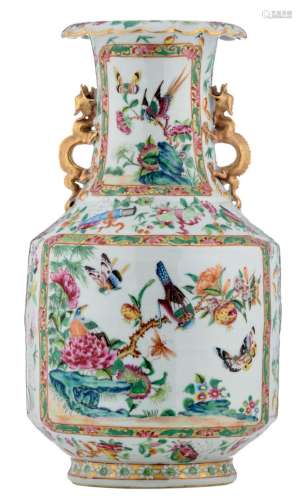 A Chinese famille rose baluster shaped vase, decorated with birds, insects, antiquities and flower branches, the handles dragon gilt decorated, 19thC, H 40,5 cm