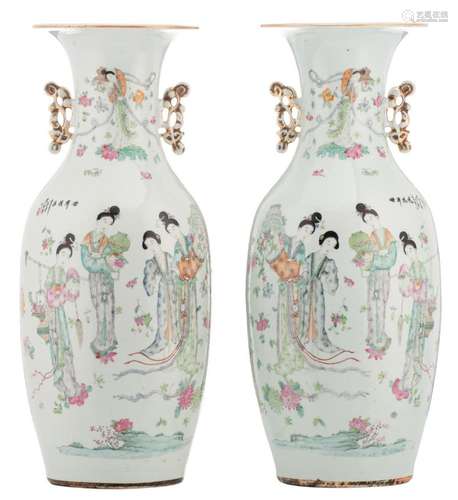 A pair of Chinese famille rose vases, finely decorated with court ladies in a garden and calligraphic texts, signed, 19thC, H 57 cm