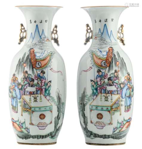 A pair of Chinese famille rose vases, decorated with warriors in a mountainous landscape and calligraphic texts, H 57 - 57,5 cm