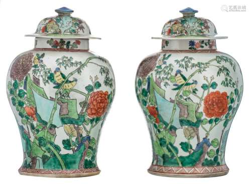 Two Chinese famille verte vases and covers, overall decorated with rocks, birds and flower branches, marked, H 41 - 41,5 cm