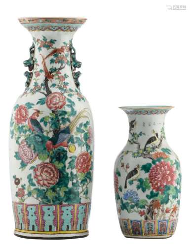 A Chinese famille rose vase, both sides decorated with phoenix, birds, rocks and flower branches, 19thC; added a ditto vase, overall decorated with birds on flower branches and butterflies, H 35,5 - 60 cm