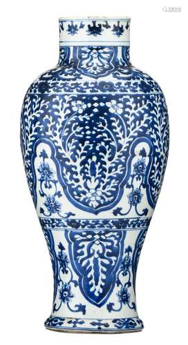 A Chinese blue and white floral decorated baluster shaped vase, with a symbol mark, 18thC, H 52 cm