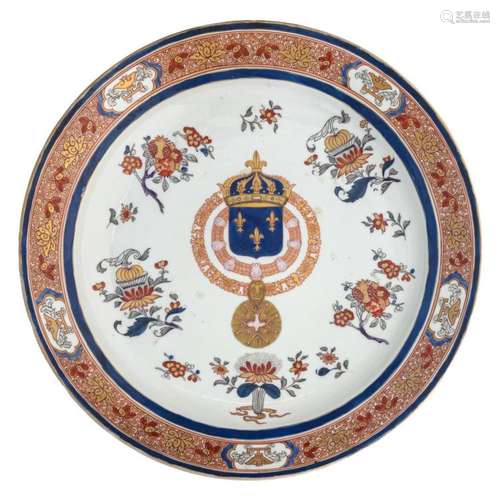 A Chinese Imari export porcelain armorial plate, decorated with flower branches, painted in the center with the Royal arms of France, encircled by the collars of the Orders of Saint-Michel and Saint-Esprit, ø 44,5 cm