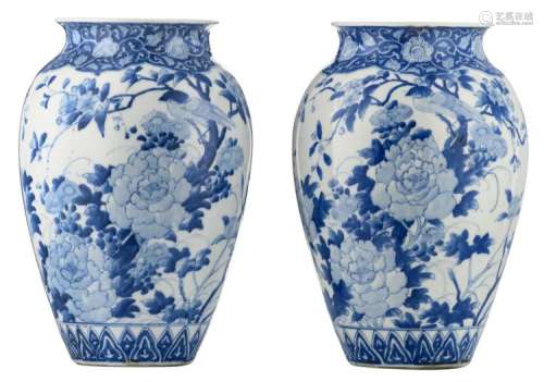 Two Japanese blue and white vases, overall decorated with birds and flower branches, H 32 cm