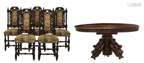 A late 19thC French oval oak Baroque revival table with five LXIII style chairs, H 78,5 - 108 - W 159 - D 125 cm