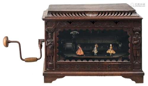 A 19thC music box with a carillon and dancing figures, no indications about music parts or makers, H 46,5 - W 65,5 - D 39 cm