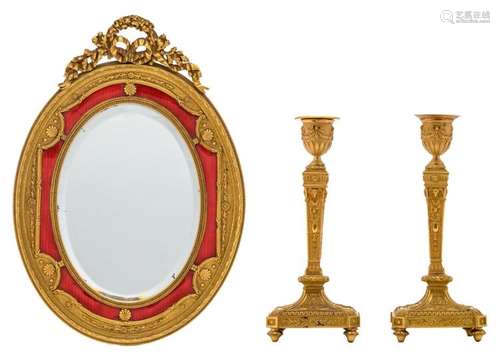 A pair of 19thC Neoclassical gilt bronze candlesticks with the mention '24 Bd Italiens' (probably Siot-Decauville) and no. 2168 and a ditto early 20thC oval table mirror, H 20 - 29,5 cm