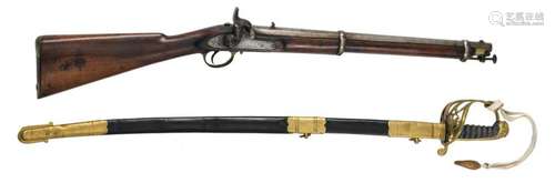 An Enfield rifle with walnut butt, marked V.R., dated 1858; added a parade saber, also marked V.R., W 94 - 100 cm