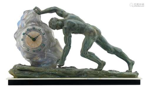 A 30s zamac and frosted glass mantle clock depicting Sisyphus, on an onyx and black marble base, H 38 - W 64,5 cm