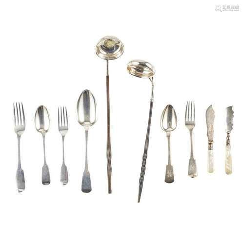 A composite suite of silver flatware Main suite weight: 87oz